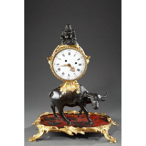 A mid-18th century patinated and ormulu "Chinoiserie"mantel-clock